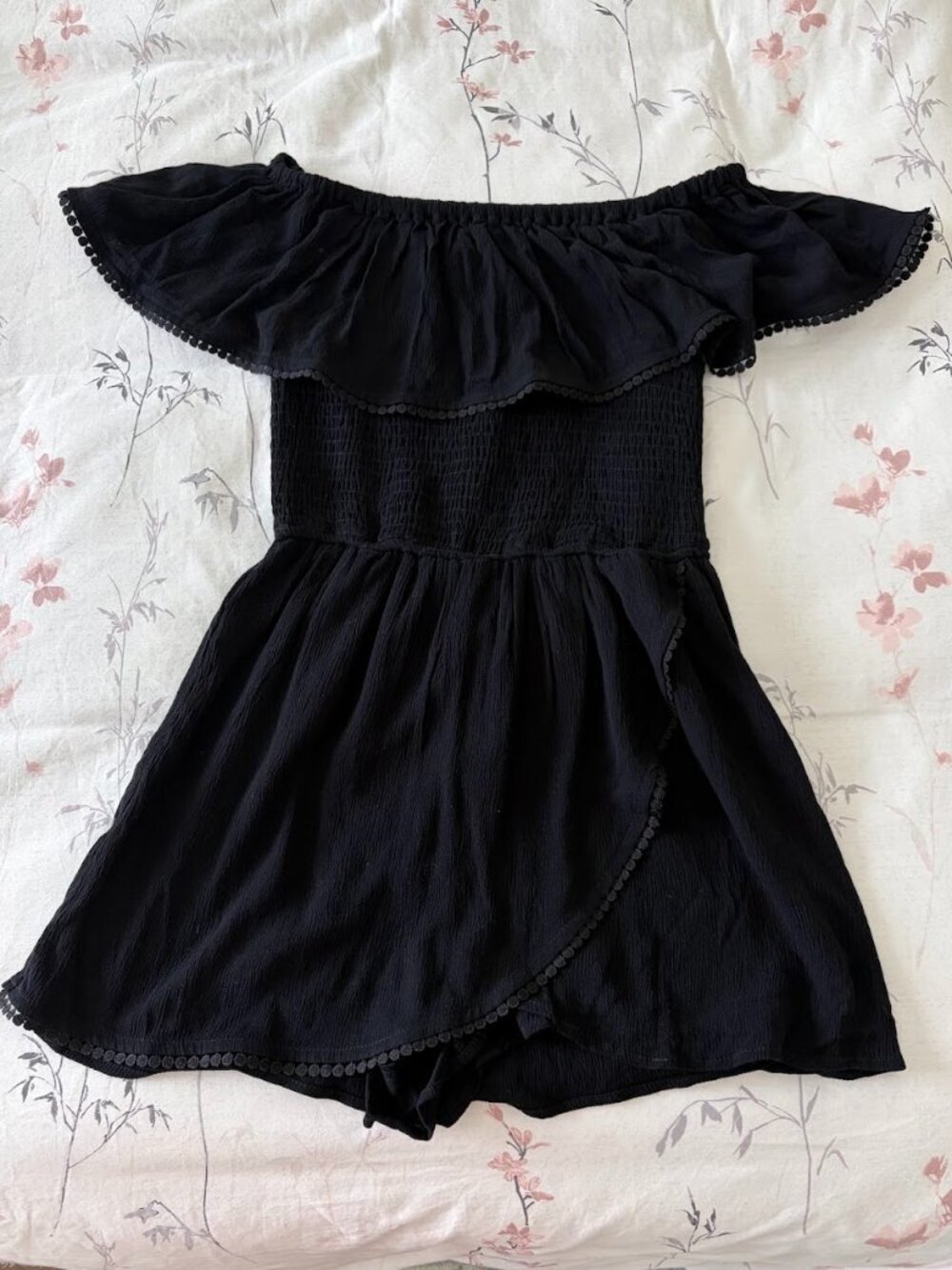 Justify Black Off-The-Shoulder Smocked Ruffle Romper with Pom-Pom Trim